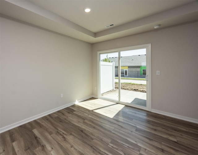 2228 Legacy Dr, Norwalk, IA 50211 - unfurnished room featuring baseboards, dark wood finished floors, recessed lighting, and a smoke detector