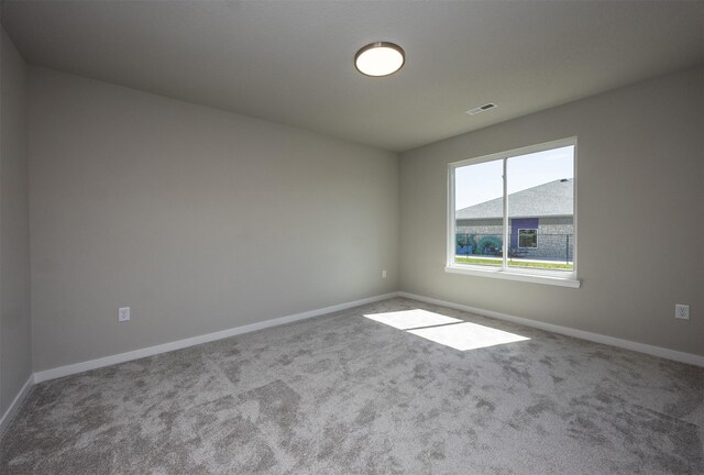 2232 Legacy Dr, Norwalk, IA 50211 - carpeted spare room featuring baseboards
