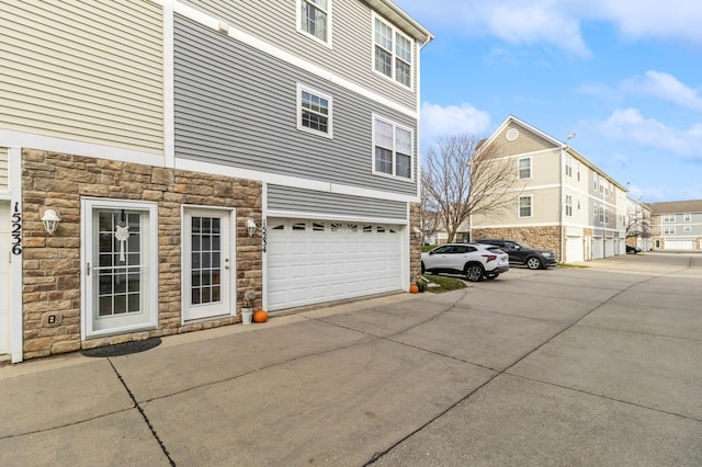 view of property exterior with a garage