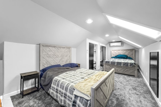 bedroom with a wall mounted air conditioner, lofted ceiling with skylight, and dark colored carpet