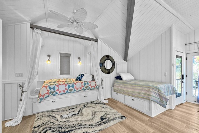 bedroom featuring light hardwood / wood-style flooring, access to outside, lofted ceiling, and ceiling fan