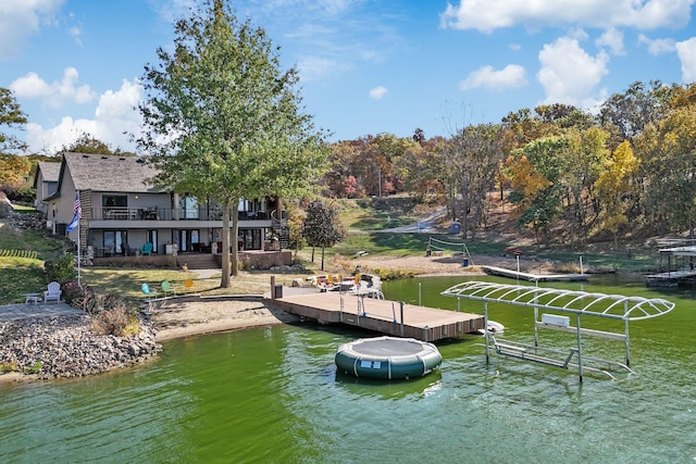 dock area with a water view