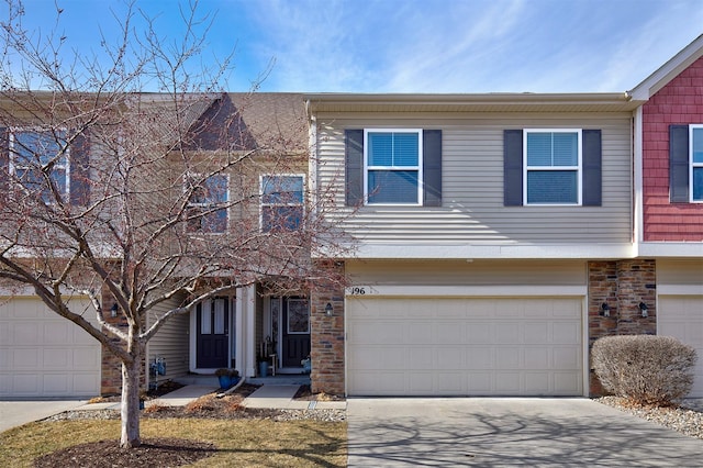 multi unit property featuring a garage