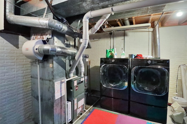 laundry room featuring washing machine and dryer