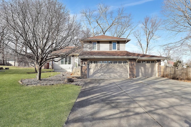 view of front of house with a garage and a front lawn