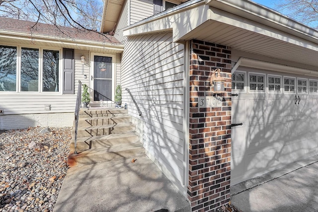 property entrance with a garage