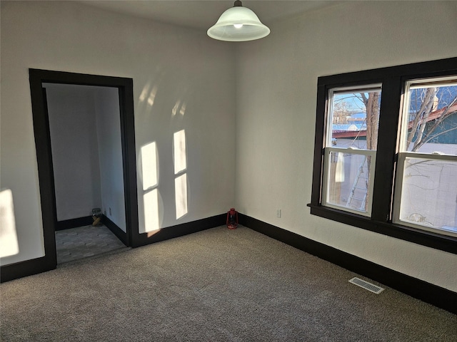 view of carpeted spare room