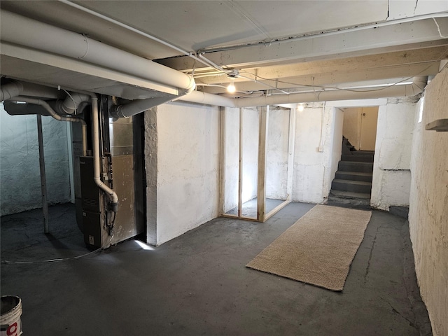 basement featuring heating unit