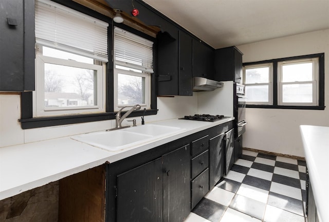 kitchen with sink and black appliances