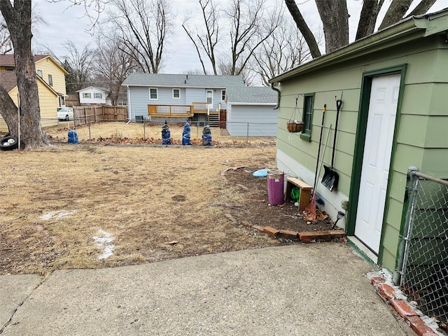 view of yard featuring a wooden deck