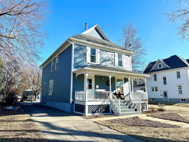 view of front property featuring covered porch