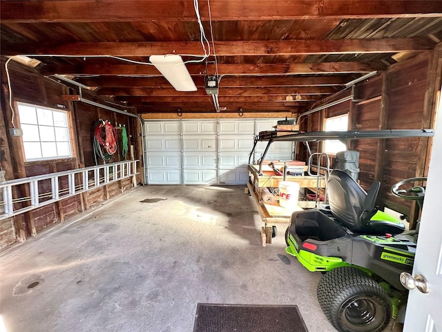 garage featuring a garage door opener