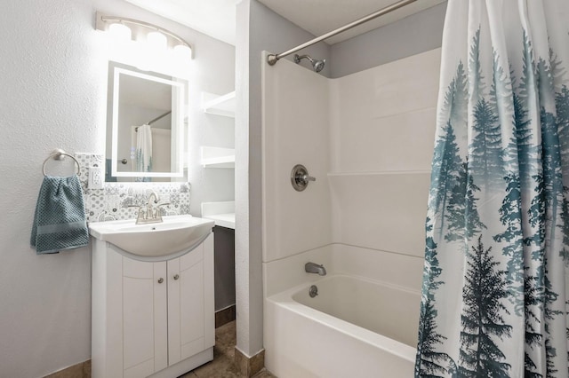 bathroom with shower / bath combo with shower curtain and vanity