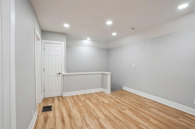 504 E Jackson Ave, Des Moines, IA 50315 - unfurnished room with light wood-type flooring and recessed lighting