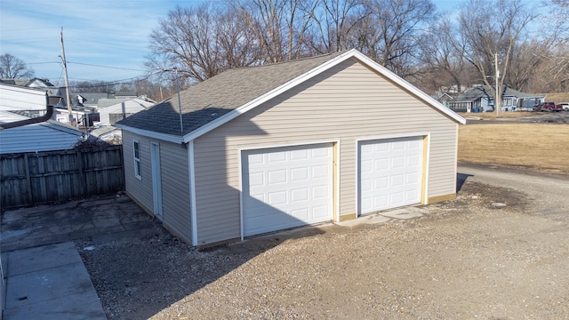 garage with fence