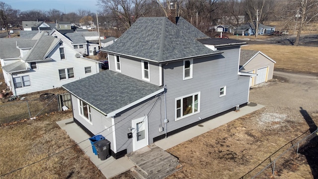 birds eye view of property with a residential view