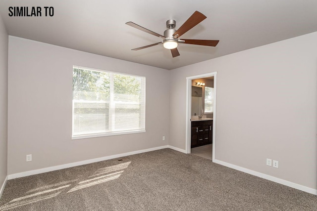 interior space with carpet and ceiling fan