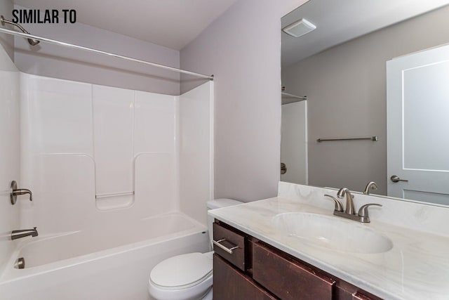 full bathroom featuring vanity, toilet, and washtub / shower combination