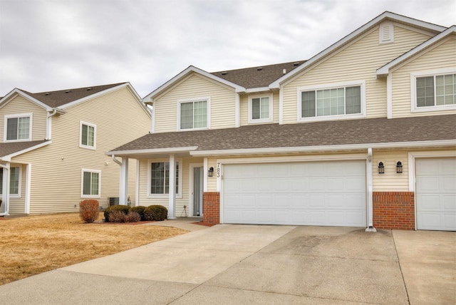 view of front of property with a garage