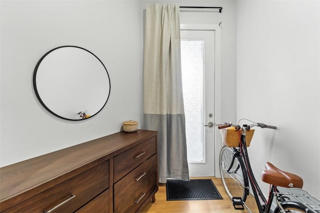 entryway with light hardwood / wood-style flooring