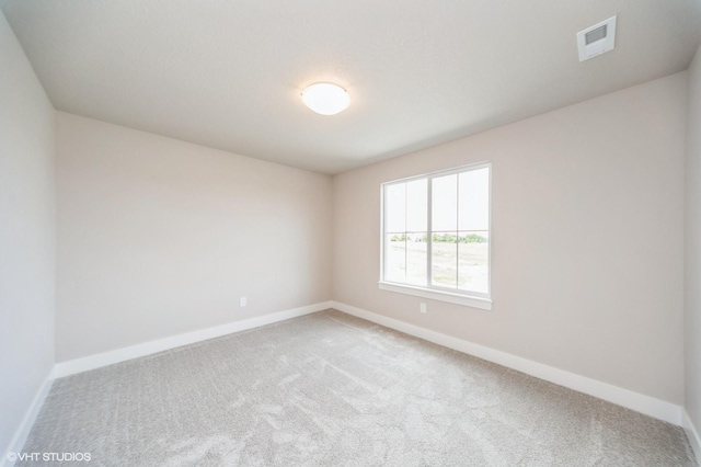 1461 S 91st St, West Des Moines, IA 50266 - spare room with light colored carpet and baseboards