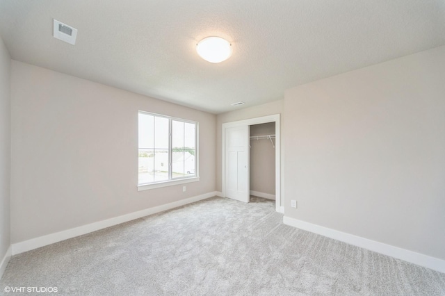 1461 S 91st St, West Des Moines, IA 50266 - unfurnished bedroom featuring carpet floors and a closet