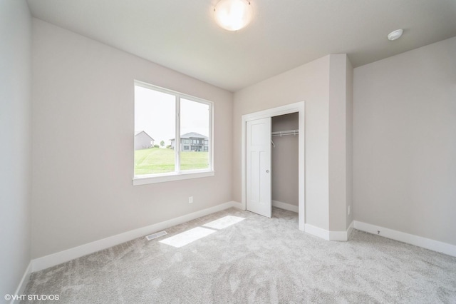 1461 S 91st St, West Des Moines, IA 50266 - unfurnished bedroom featuring carpet and a closet