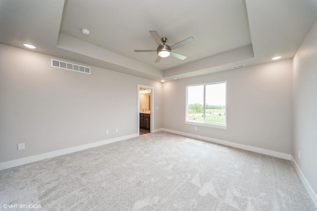 1461 S 91st St, West Des Moines, IA 50266 - carpeted spare room with a raised ceiling, ceiling fan, recessed lighting, and a smoke detector