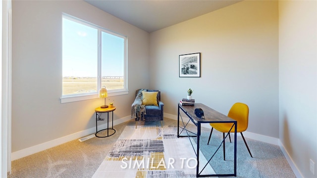 home office with baseboards, visible vents, and carpet