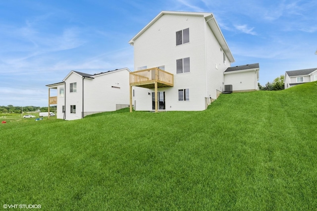 5616 Leyden Ave, Des Moines, IA 50317 - back of property with a yard and a deck