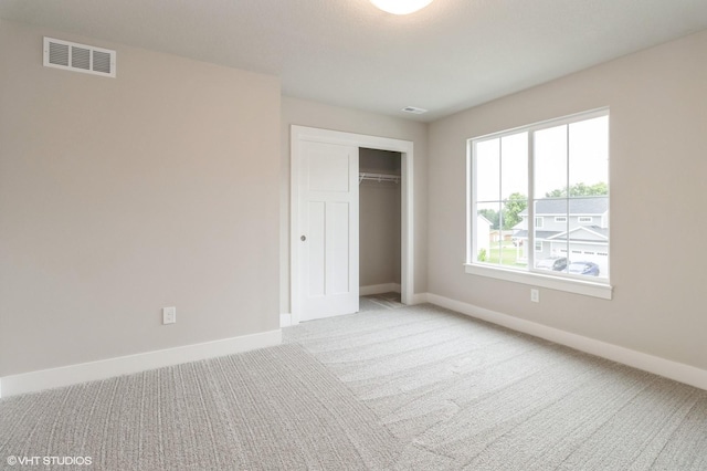 5616 Leyden Ave, Des Moines, IA 50317 - unfurnished bedroom featuring carpet flooring and a closet