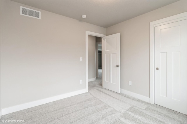5616 Leyden Ave, Des Moines, IA 50317 - unfurnished bedroom featuring carpet and baseboards