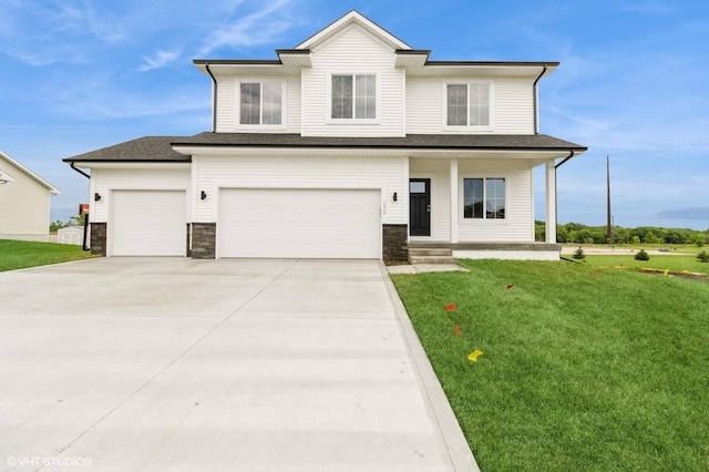 5656 Brook View Ave, Des Moines, IA 50317 - view of front of home featuring a front lawn, a garage, driveway, stone siding, and covered porch