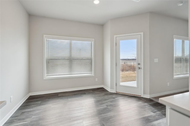 doorway to outside with dark hardwood / wood-style flooring