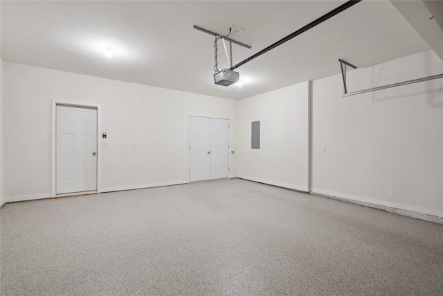 garage featuring a garage door opener and electric panel