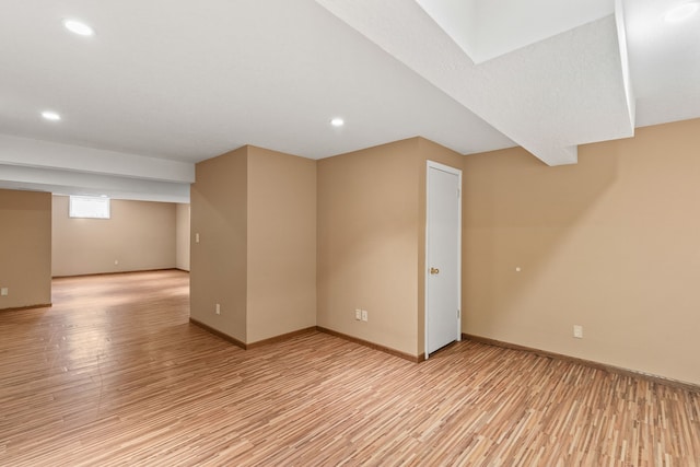 basement with light wood-type flooring