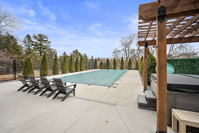 view of swimming pool featuring a pergola, a patio, fence, a fenced in pool, and a hot tub