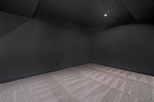 unfurnished room featuring recessed lighting, light colored carpet, and baseboards