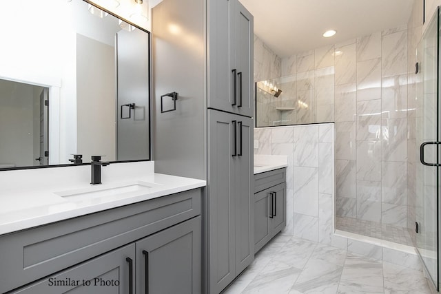 bathroom with vanity and walk in shower