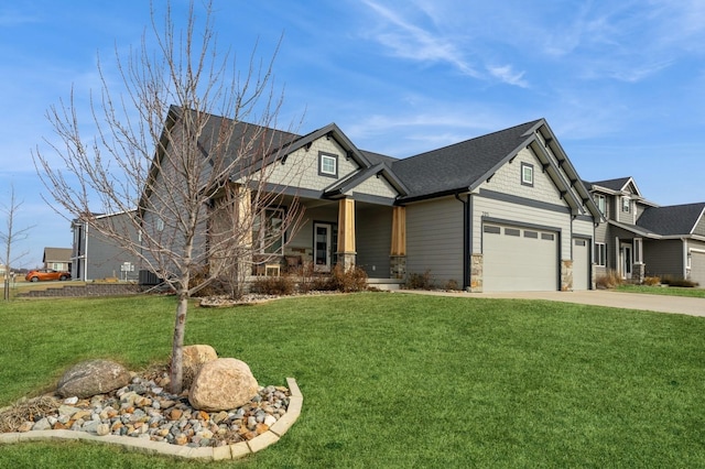 craftsman-style house featuring a porch, concrete driveway, a front yard, and stone siding