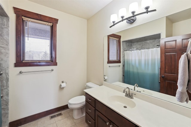 bathroom featuring vanity, tile patterned floors, toilet, and a shower with shower curtain