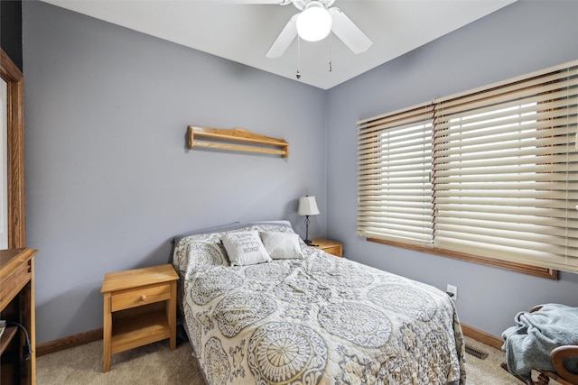 6805 Aubrey Ct, Johnston, IA 50131 - bedroom featuring carpet and a ceiling fan