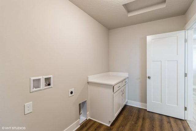 15019 Springbrook Trl, Urbandale, IA 50323 - laundry area featuring hookup for an electric dryer, washer hookup, dark wood-type flooring, attic access, and cabinet space