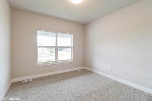 15019 Springbrook Trl, Urbandale, IA 50323 - carpeted spare room featuring baseboards