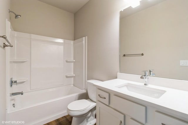 15019 Springbrook Trl, Urbandale, IA 50323 - full bathroom featuring vanity, washtub / shower combination, and wood finished floors