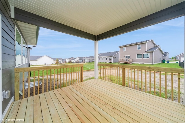 15015 Springbrook Trl, Urbandale, IA 50323 - wooden terrace featuring a residential view and a yard