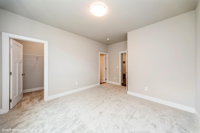 15015 Springbrook Trl, Urbandale, IA 50323 - unfurnished bedroom with carpet floors and a walk in closet