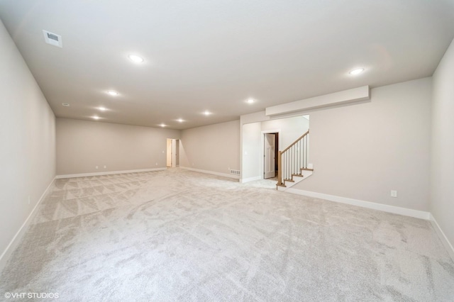15015 Springbrook Trl, Urbandale, IA 50323 - finished below grade area with light colored carpet, stairs, and recessed lighting