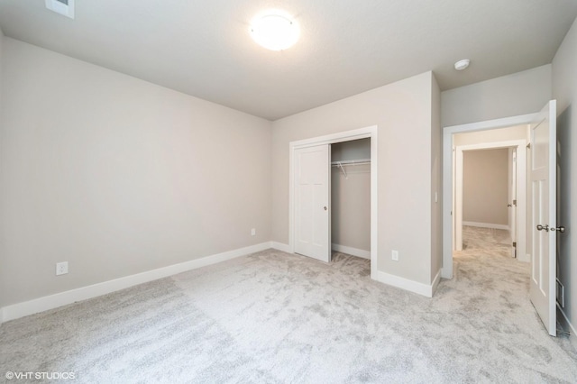 15015 Springbrook Trl, Urbandale, IA 50323 - unfurnished bedroom with light colored carpet and a closet