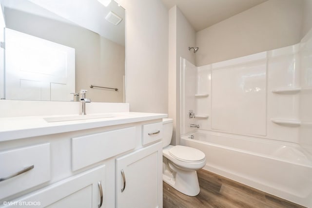15015 Springbrook Trl, Urbandale, IA 50323 - bathroom featuring vanity, wood finished floors, and shower / tub combination